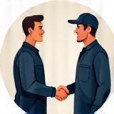 Smiling customer shaking hand of a technician